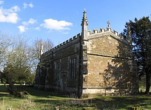 A chapel in one cell with a battlemented parapet and crocketted pinnacles at the corners