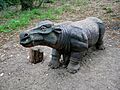 Coryphodon Statue at the Fossil Pit, Lesnes Abbey Woods.jpg