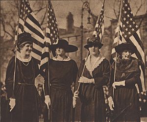 Group of paraders in the division of patriotic women. 1917. Mrs. Gifford Pinchot, Mrs. J. Gordon Douglas, Mrs. Cornelius Tangeman, & Mrs. Katherine McCook Knox