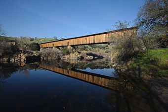 Knight's Ferry covered bridge, Stanislaus River, California.jpg