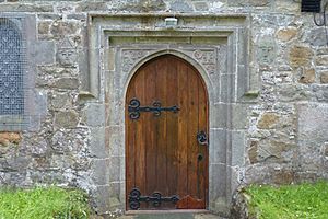 Llanbedrgoch St Peters Church, Anglesey - door and carvings