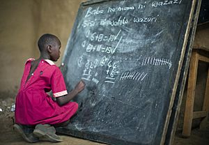 Masai girl at school doing maths