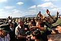 President Lyndon B. Johnson in Vietnam, Handshakes in a crowd of troops - NARA - 192517 - cropped, color corrected