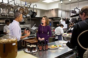 Barack Obama participates in a live NBC interview in the White House Kitchen with Savannah Guthrie, 2015