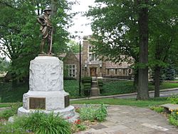 Edgewood's municipal building with its World War I memorial in the foreground