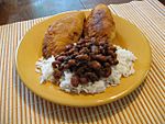 Natchitoches meat pies with beans and rice