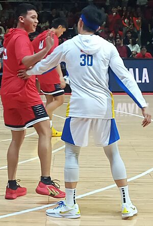 Patting on the back sometimes occurs before the game like this one from the Philippines.