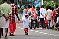 Child holding Communist Party of ndia (Marxist) Flag