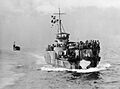 Crowded US Navy LCIs approaching Labuan on 10 June 1945