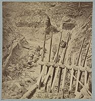 Dead Confederate soldier in trenches of Fort Mahone in front of Petersburg, Va., April 3, 1865 LCCN2012647837