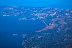 Flight from LAS to YVR - looking down on Oak Harbour on Whidbey Island - (22799126552)