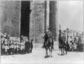 Gen. Pershing riding through Arc de Triomphe in parade with aide-de-camp George C. Marshall. LCCN2016652673