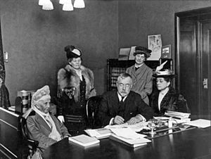 Governor William Spry of Utah meets with suffrage leaders, Emmeline Wells and others in 1915