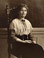 Emmeline Pankhurst, seated (1913)