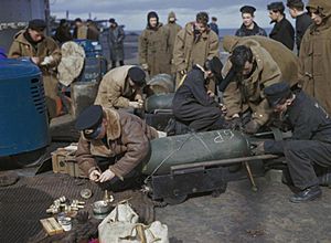 Fleet Air Arm personnel fusing bombs prior to the 3 April 1944 attack on Tirpitz