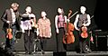 Laurie Anderson amidst the Kronos Quartet in Chicago after performing LANDFALL 2015-03-17 20.53.41 (16851029595)