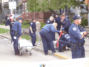Madison police with stretcher