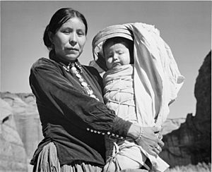 "Navajo Woman and Infant, Canyon de Chelle, Arizona." (Canyon de Chelly National Monument), 1933 - 1942 - NARA - 519947