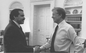 Antonio Joseph Mendez and Jimmy Carter (cropped).gif