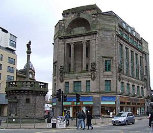Glasgow Mercat Cross (left), designed by Edith Hughes in 1930