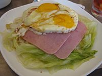 Ham and eggs over rice