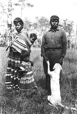 Seminole Josie Billie with family and dog