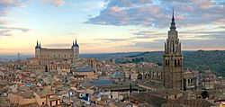 Toledo at sunrise — The Alcázar on the left and Cathedral on the right dominate the skyline