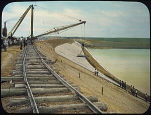 Belle Fourche Project - Dam, Upstream Face - placing the paving - South Dakota - NARA - 294654