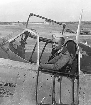 Major George S. “Spanky” Roberts at the controls of a P-51 Mustang.jpg