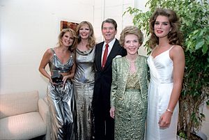 President Ronald Reagan and Nancy Reagan posing for photo with Christie Brinkley, Cheryl Tiegs, and Brooke Shields