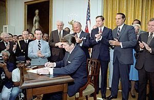 President Ronald Reagan at the signing ceremony for Voting Rights Act legislation in the East Room