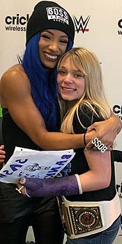 Sasha Banks with Fan 2019