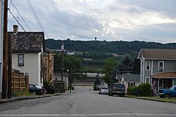 Typical scene on one of the borough's steep streets, with the Conway Yard and the Ohio River visible in the distance