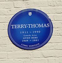 blue plaque commemorating Terry-Thomas