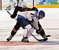 Finland vs Germany faceoff Olympics 2010 (cropped1)