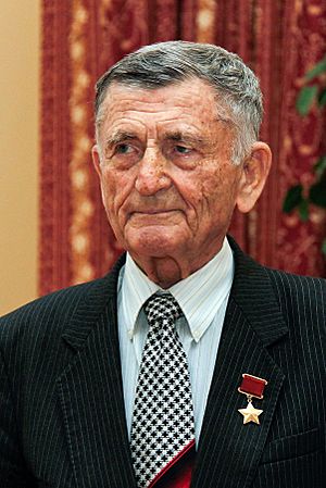 Portrait-photo of Sergei Kramarenko wearing his gold star medal in 2010.