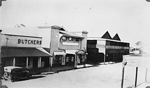 StateLibQld 1 158746 Businesses in Main Street, Proserpine in the 1930s