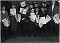 After midnight selling extras. There were many young boys selling very late these nights. Youngest boy in the group... - NARA - 523536