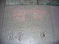 Alan Alda (handprints and signature in cement)