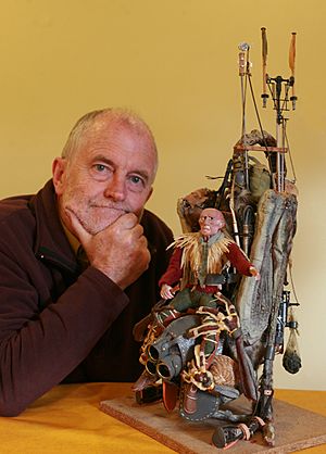 Dougal Dixon with a model of one of his creatures