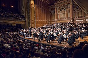 NEC Philharmonia, Concert Choir, and conductor Hugh Wolff