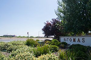 Natomas marker sign (right foreground) and Sleep Train Arena (left background)