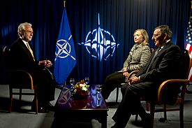 Wolf Blitzer interviews Panetta and Clinton at NATO headquarters on April 18, 2012