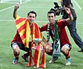Xavi and Sergio Busquets Euro 2012 trophy