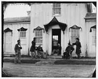 Arlington, Va. Capt. Nevins and officers in front of headquarters, Fort Whipple; mourning crepe drawn over doors and windows LOC cwpb.03813
