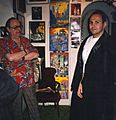 Forrest J. Ackerman, collector of movie memorabilia, with fan.