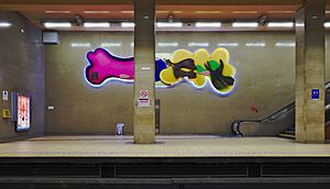 Joséphine-Charlotte metro station platform, facing "Les oiseaux émerveillés" by Serge Vandercam in (Woluwe-Saint-Lambert, Belgium)