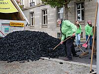 Protest of Greenpeace with coal in front of the German Chancellery 10