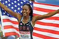 Sanya Richards with US flag Berlin 2009