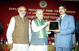 The Union Minister for Human Resource Development Dr. Murli Manohar Joshi presenting "Best Employer's Award - 2003" to one of the awardee at a function, in New Delhi on December 3